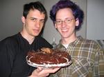Simon and Greg wtih a cake